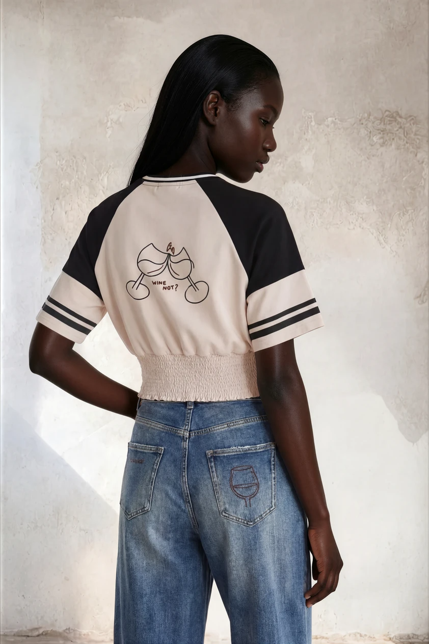 MAGLIETTA DRAPPEGGIATA CON SCOLLO A V